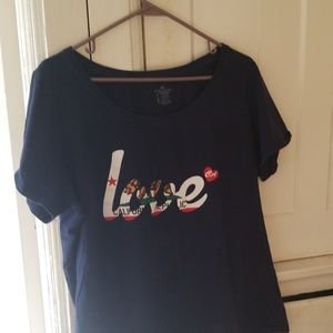 Ladies top.  Never worn it and says love on it